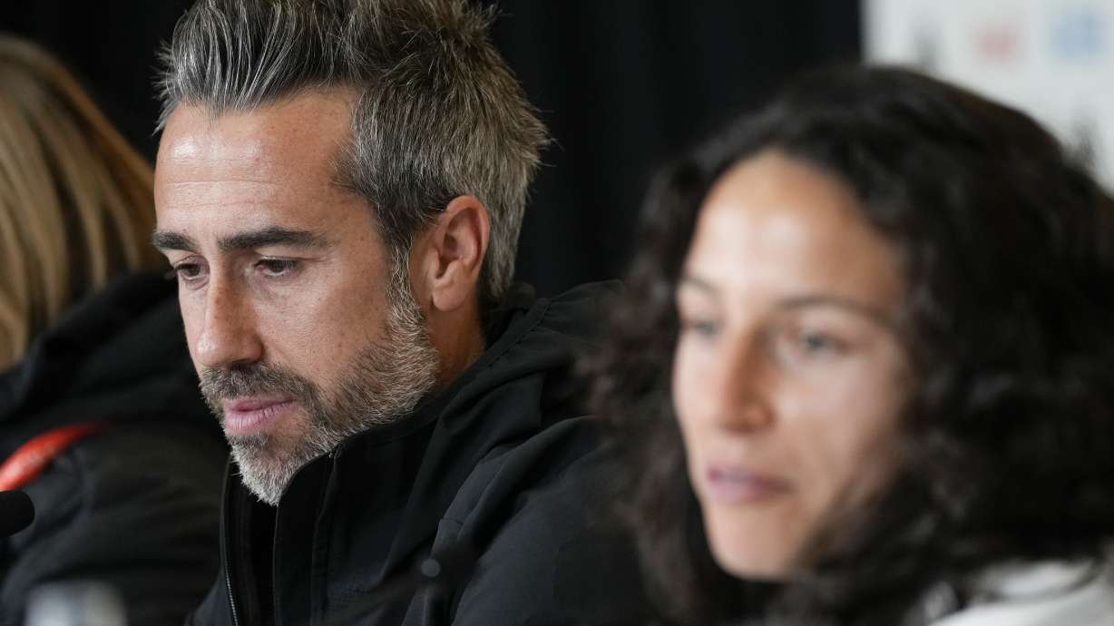 Spain's head coach Jorge Vilda, left, and Spain's Ivana Andres attend a press conference ahead of the Women's World Cup quarterfinal soccer match between Spain and Netherlands in Wellington, New Zealand, Thursday, Aug. 10, 2023.