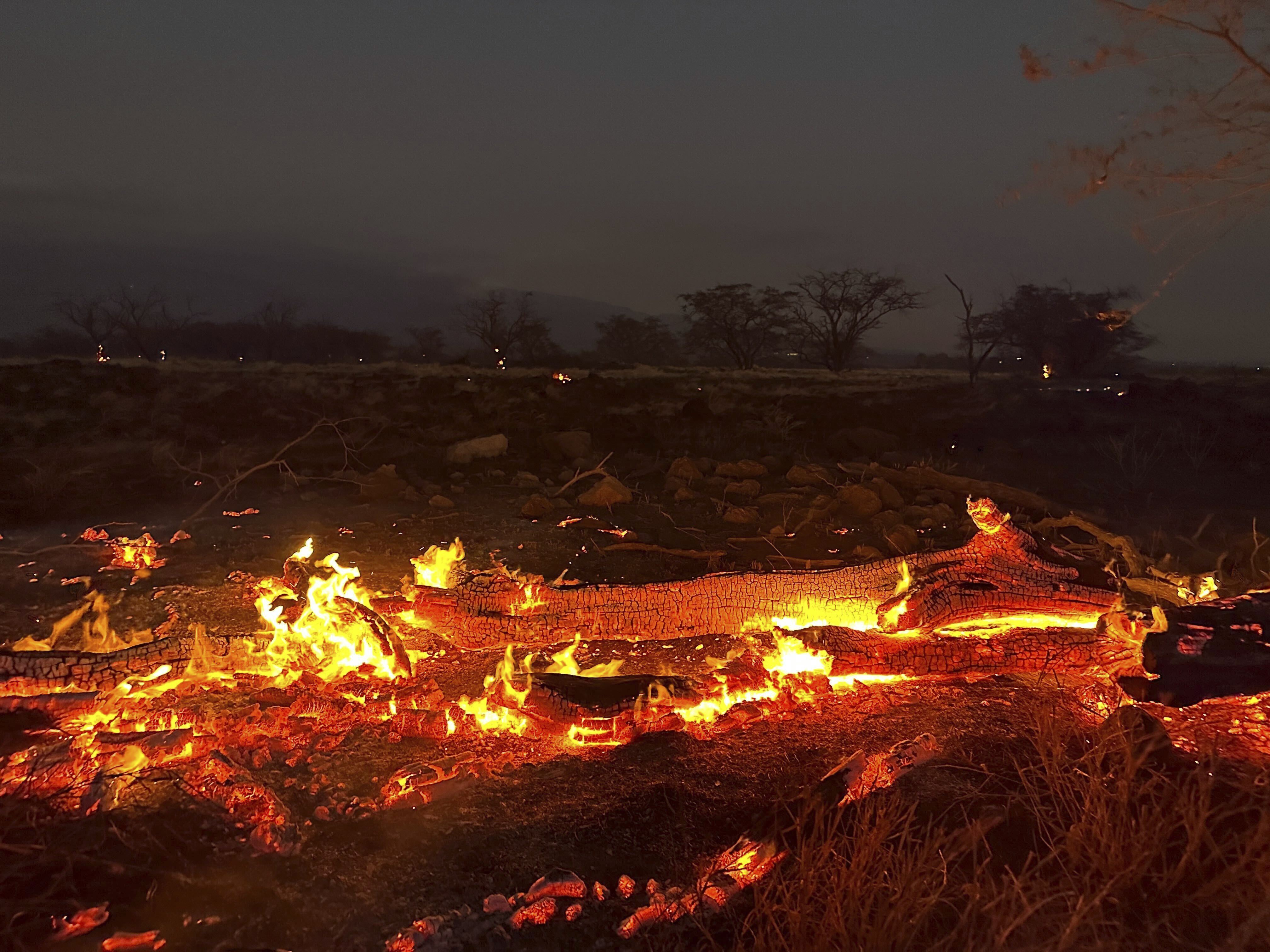 A wildfire burns in Kihei, Hawaii, late Wednesday.