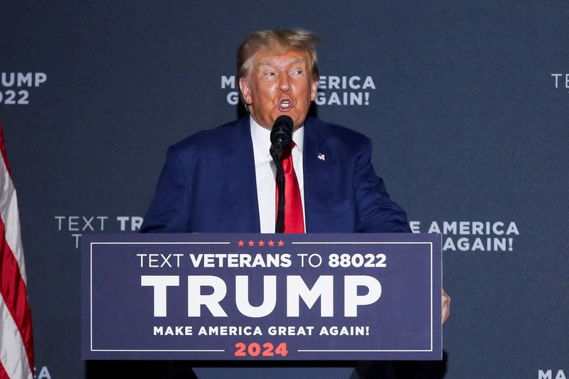 Former President and Republican presidential candidate Donald Trump speaks during a campaign rally in Windham, N.H., Tuesday. A judge agrees to limit a protective order in a case about the 2020 election Friday.