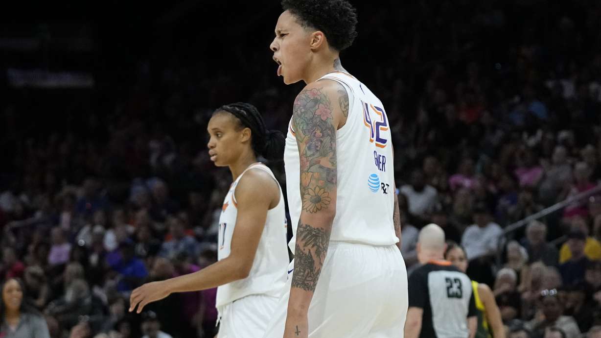 Phoenix Mercury center Brittney Griner, foreground, argues with officials as forward Brianna Turner walks past during the second half of the team's WNBA basketball game against the Seattle Storm on Saturday, Aug. 5, 2023, in Phoenix. The Storm won 97-91.