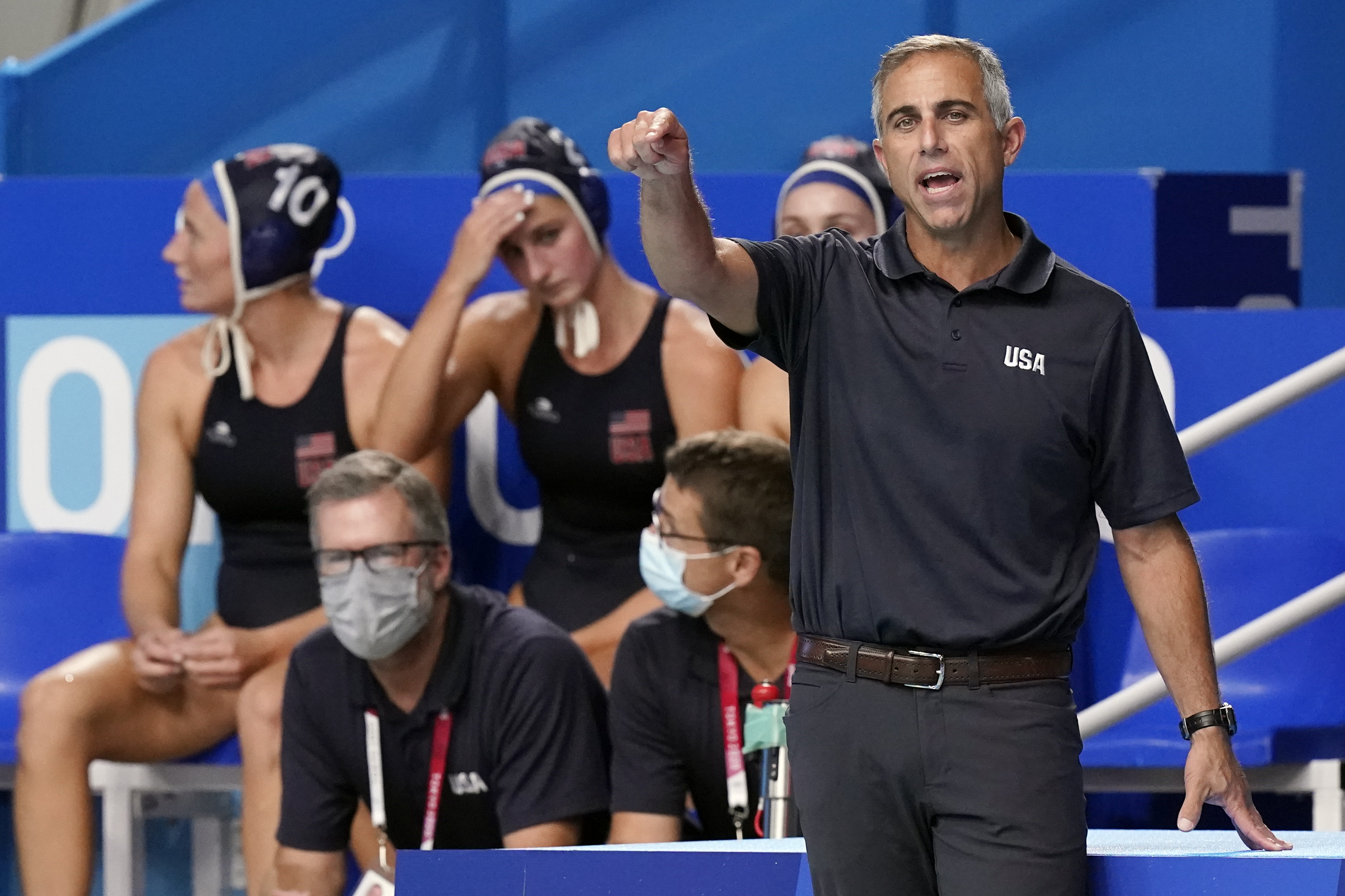 FILE - United States head coach Adam Krikorian directs players during a quarterfinal round win over Canada in a women's water polo match at the 2020 Summer Olympics, Tuesday, Aug. 3, 2021, in Tokyo, Japan. With the Paris Olympics coming up next year, U.S. women's water polo coach Adam Krikorian is feeling the pressure of time. No water polo team — men or women — has won four straight gold medals at the Games. 