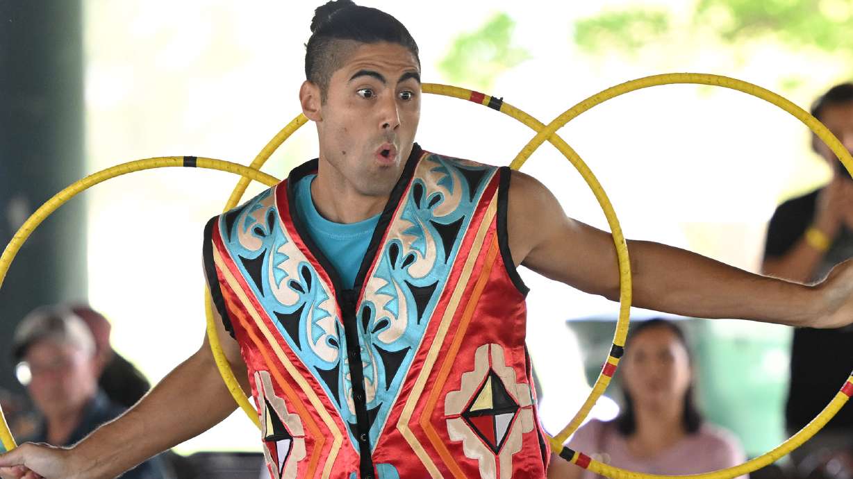 Hoop dancer Eric Hernandez dances at Utah Native Market Days at Thanksgiving Point in Lehi on Friday. All proceeds are going to Native student scholarships. There is hoop dancing, food and crafts and the event continues Saturday.
