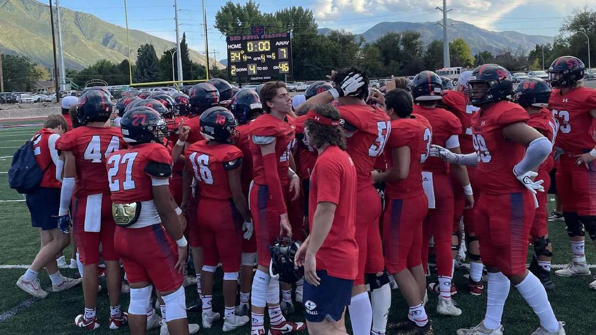 Springville High celebrates after a 34-7 win over visiting Dixie High on Aug. 11, 2023.
