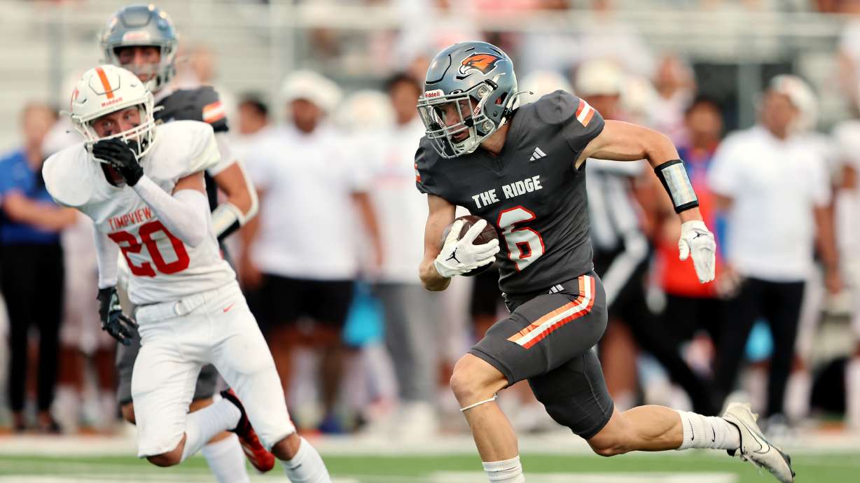 Skyridge’s Trevan McClellan gets into the secondary for a big gain as they and Timpview play at Skyridge in Lehi on Friday, Aug. 11, 2023. Skyridge won 26-14.