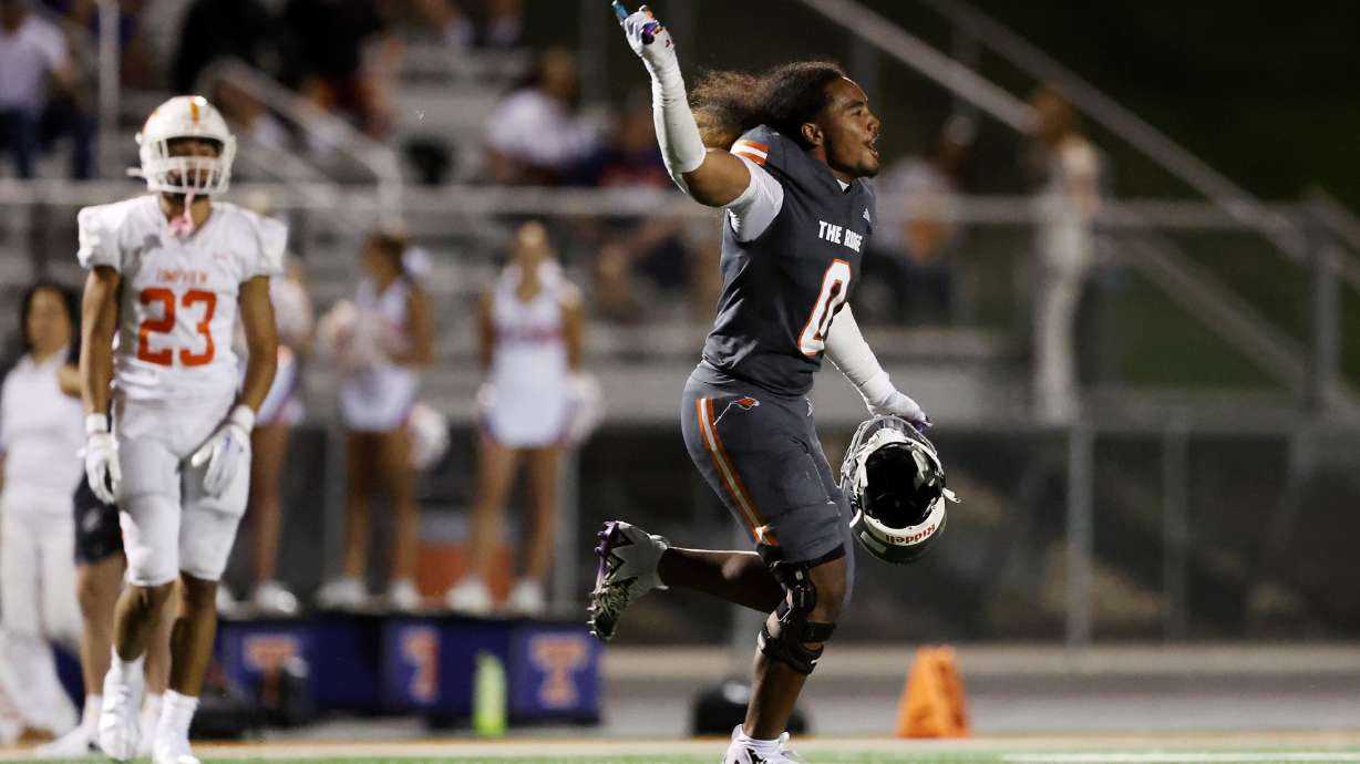 Skyridge’s Deshawn Toilolo celebrates his game winning interception as they defeat Timpview in Lehi on Friday, Aug. 11, 2023. Skyridge won 26-14.