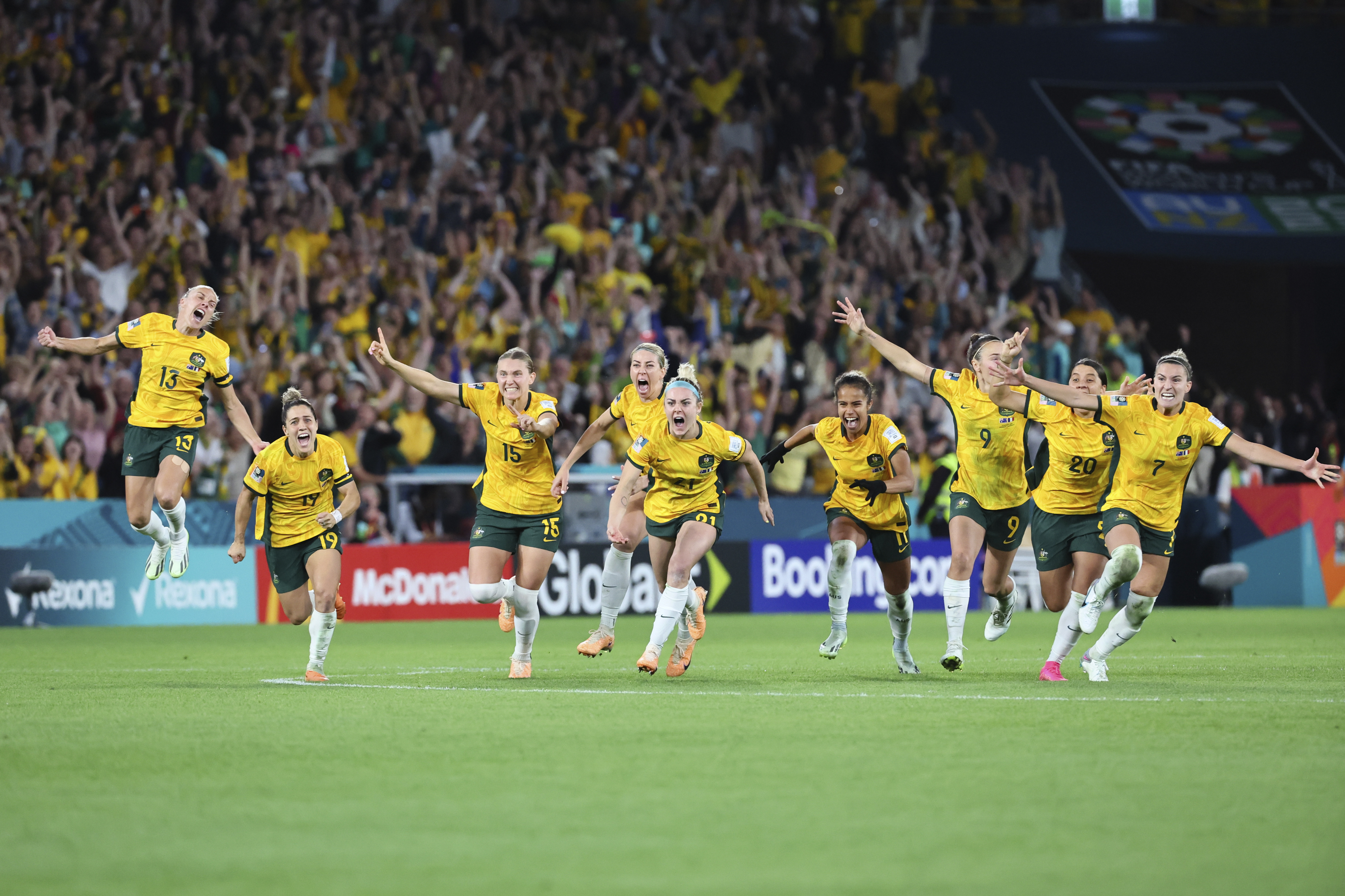 Australia players celebrate after winning the Women's World Cup quarterfinal soccer match between Australia and France in Brisbane, Australia, Saturday, Aug. 12, 2023.