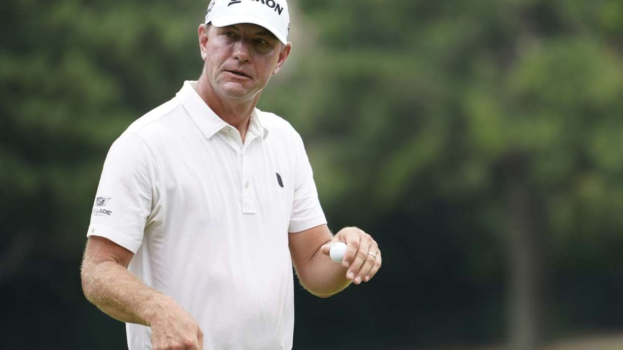 Lucas Glover walks off the sixth hole after making his putt during the third round of the St. Jude Championship golf tournament Saturday, Aug. 12, 2023, in Memphis, Tenn.