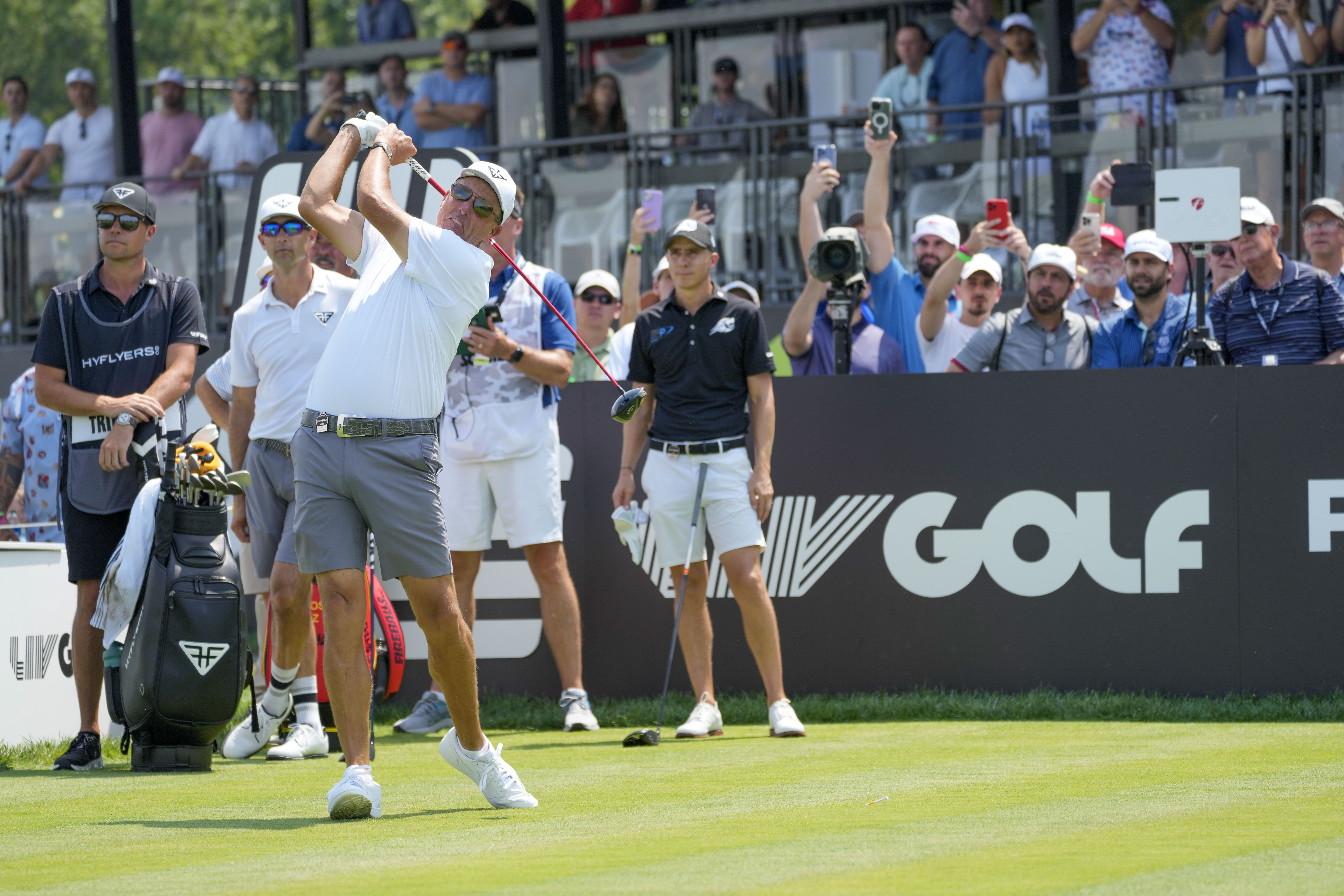 Phil Mickelson tees off on the 18th hole during the second round of the Bedminster Invitational LIV Golf tournament in Bedminster, N.J., Saturday, Aug. 12, 2023.