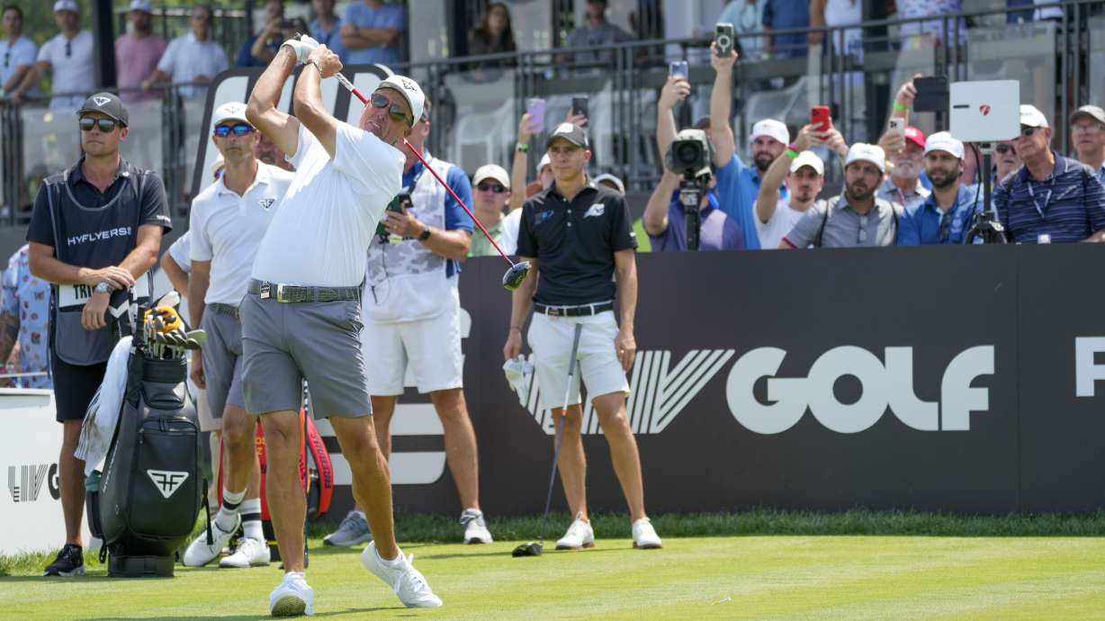 Phil Mickelson tees off on the 18th hole during the second round of the Bedminster Invitational LIV Golf tournament in Bedminster, N.J., Saturday, Aug. 12, 2023.