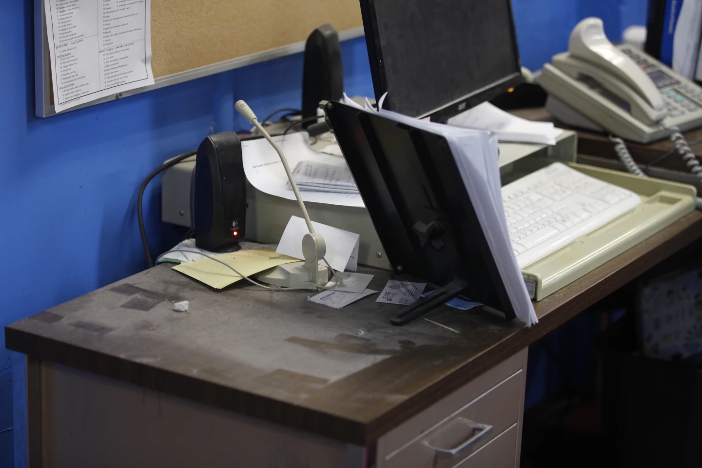 An empty spot on reporter Phyllis Zorn's desk shows where the tower for her computer sat before law enforcement officers seized it in a raid on the Marion County Record, Sunday in Marion County, Kan. Editor and Publisher Eric Meyer says the raid was designed to intimidate the newspaper as it investigated local issues.