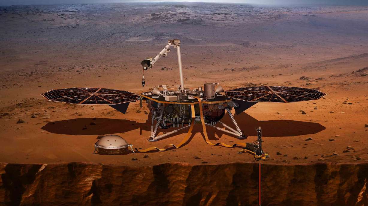 An artist's concept shows the InSight lander and all of its instruments. Mars is rotating more quickly than it used to, according to data from the lander.