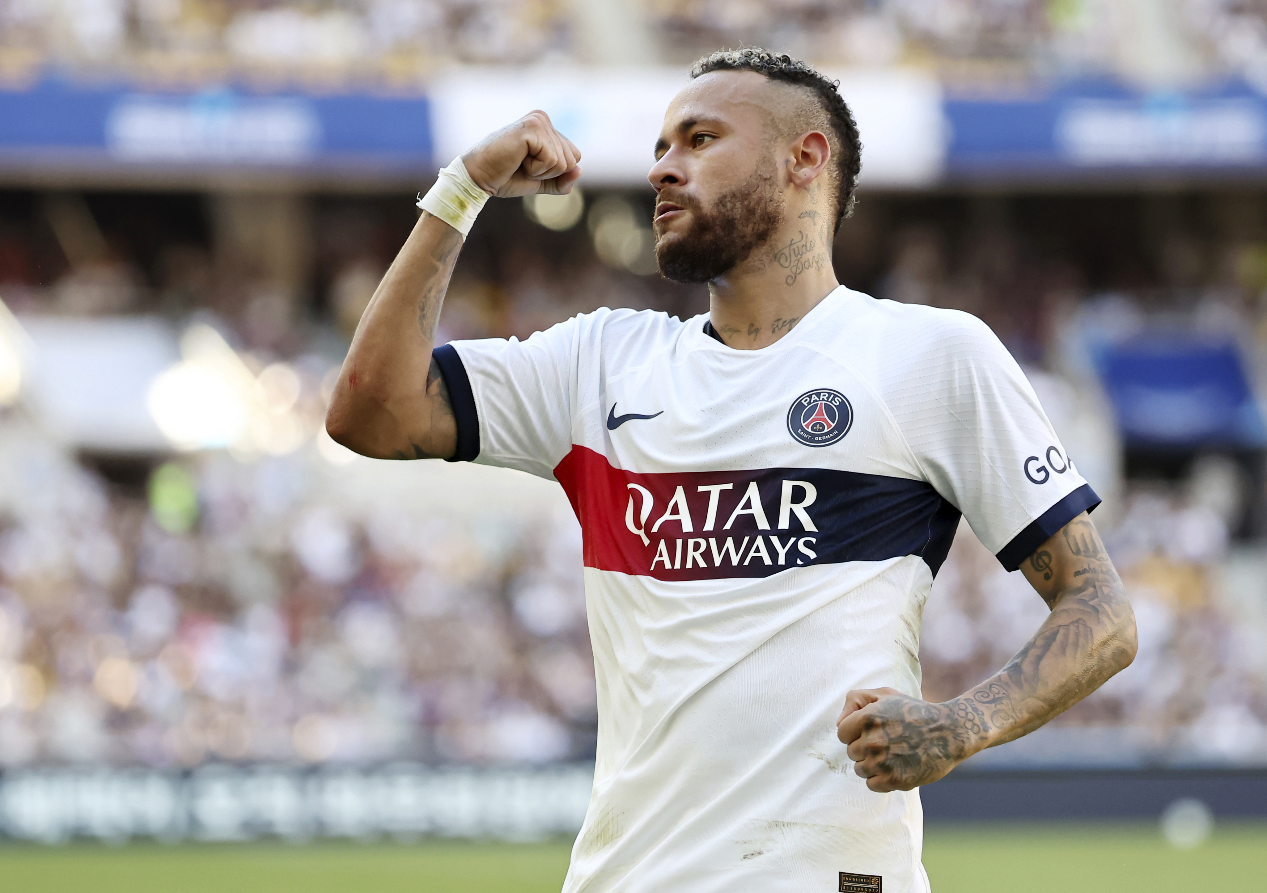 PSG's Neymar celebrates after scoring the first goal during a friendly soccer match against Jeonbuk Hyundai Motors in Busan, South Korea, Thursday, Aug. 3, 2023. 