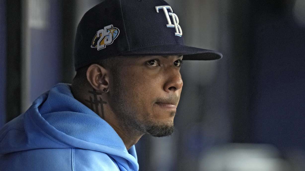 Tampa Bay Rays' Wander Franco watches from the dugout during the fifth inning of a baseball game against the Cleveland Guardians Sunday, Aug. 13, 2023, in St. Petersburg, Fla.