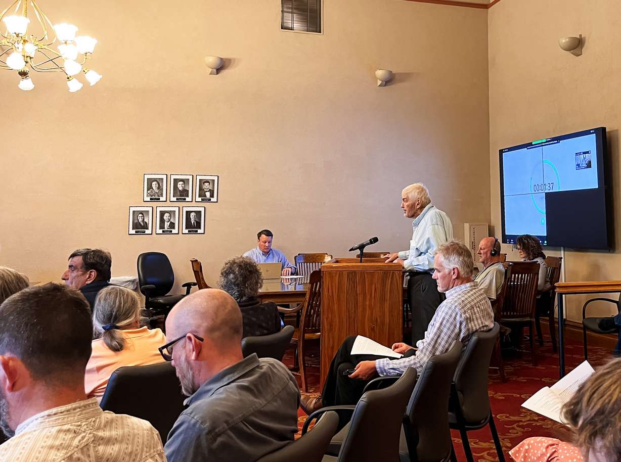 Stephen Pace offers public comment during a Salt Lake City Council meeting held on Aug. 8, while Kirk Huffaker sits to his left. The two pushed the council for an ordinance change that allows Pace to reconstruct the carriage house on the Beer Estate, which he owns.