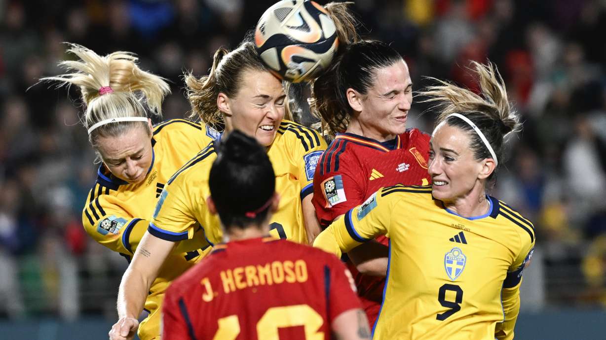 Player compete to head the ball during the Women's World Cup semifinal soccer match between Sweden and Spain at Eden Park in Auckland, New Zealand, Tuesday, Aug. 15, 2023.