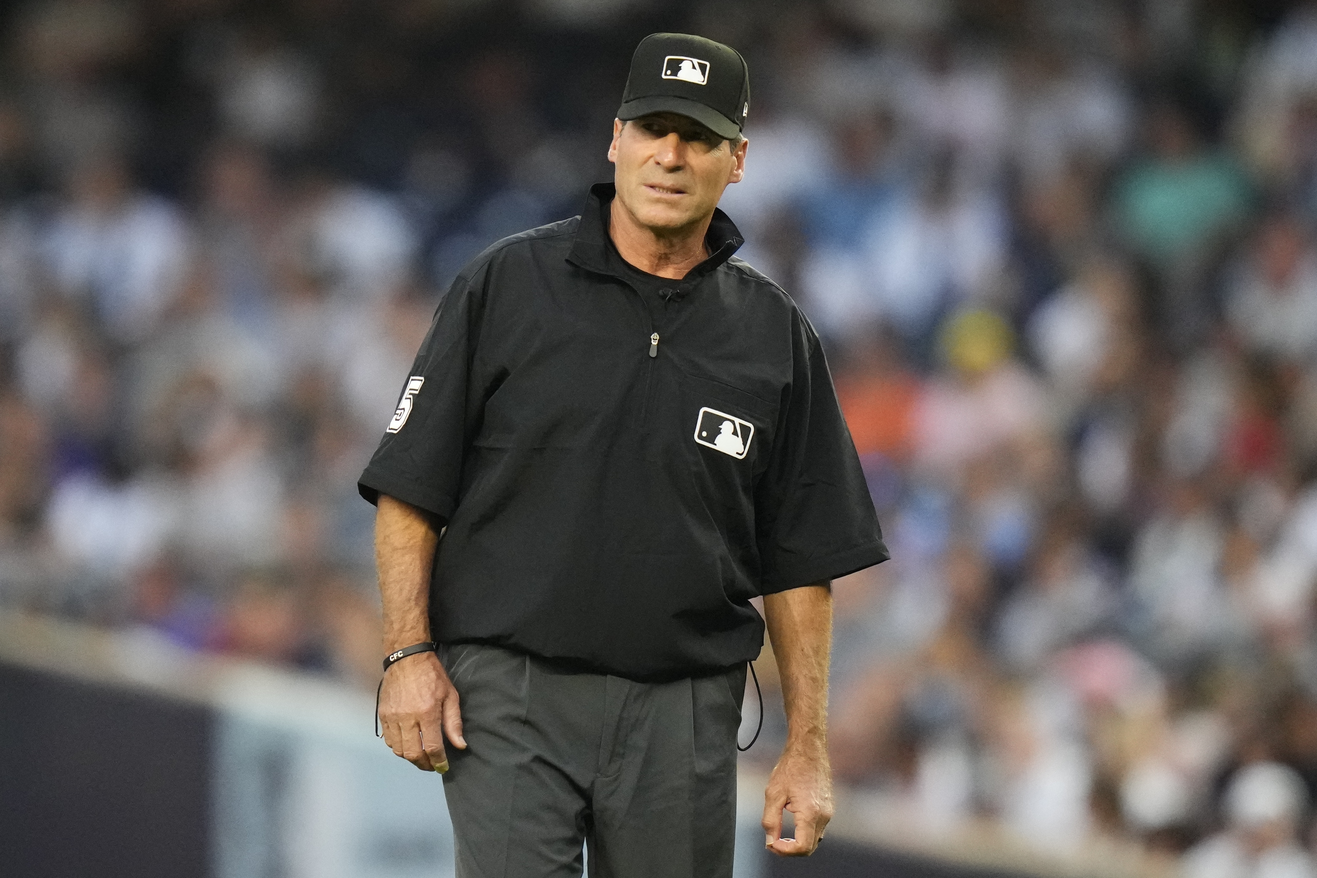 FILE - Umpire Ángel Hernández during the first inning of a baseball game between the New York Yankees and the Houston Astros, Friday, Aug. 4, 2023, in New York. Hernández lost again in his race discrimination lawsuit against Major League Baseball when a federal appeals court refused to reinstate his case on Tuesday, Aug. 15, 2023. 