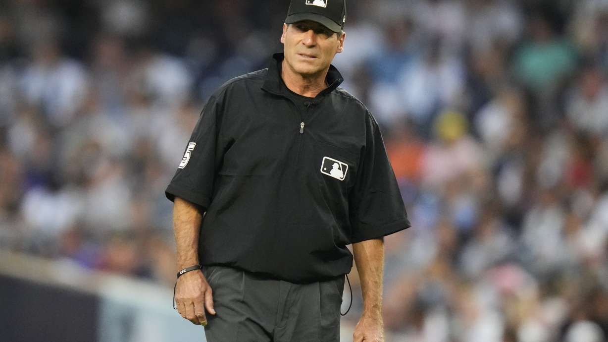 FILE - Umpire Ángel Hernández during the first inning of a baseball game between the New York Yankees and the Houston Astros, Friday, Aug. 4, 2023, in New York. Hernández lost again in his race discrimination lawsuit against Major League Baseball when a federal appeals court refused to reinstate his case on Tuesday, Aug. 15, 2023.