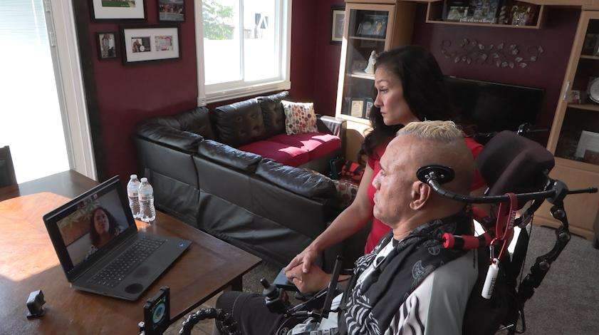 Paea and Laura Lapale get the daily update from sister-in-law Lana Phillips Monday. Phillips was displaced in the Maui fires.