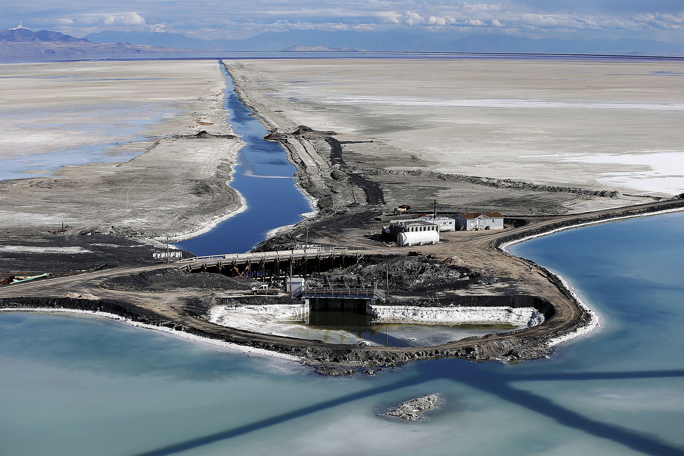 The west end of the Behrens Trench of Compass Minerals is seen on Oct. 18, 2016. The trench moves brine from the west pond complex to the east pond complex of Compass Minerals.