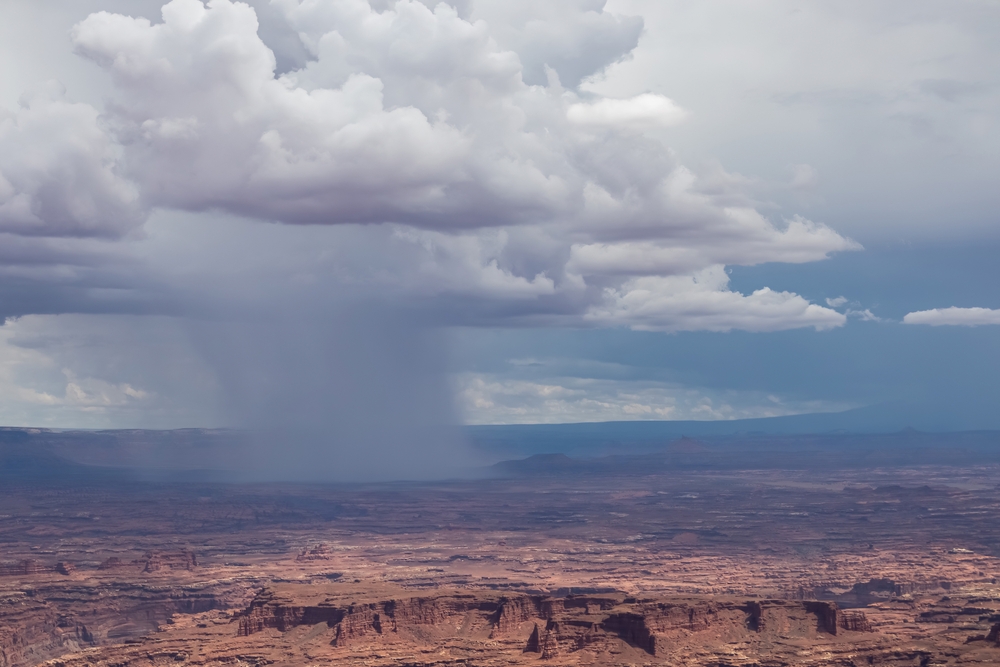 Storm clouds over Split Mountain Canyon from Grand View Point Overlook near Moab. Monsoonal moisture continues to produce flooding threats in southern Utah.