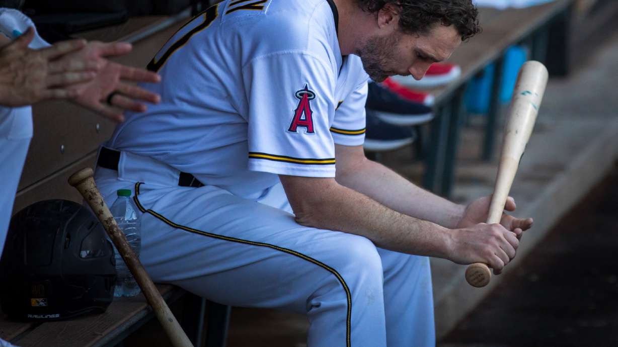 Salt Lake Bees infielder Daniel Murphy holds a bat in the dugout during a game against the El Paso Chihuahuas at Smith's Ballpark on Aug. 3. Murphy, a three-time MLB All-Star, retired from the game again on Tuesday after a career comeback attempt that took him to Salt Lake.