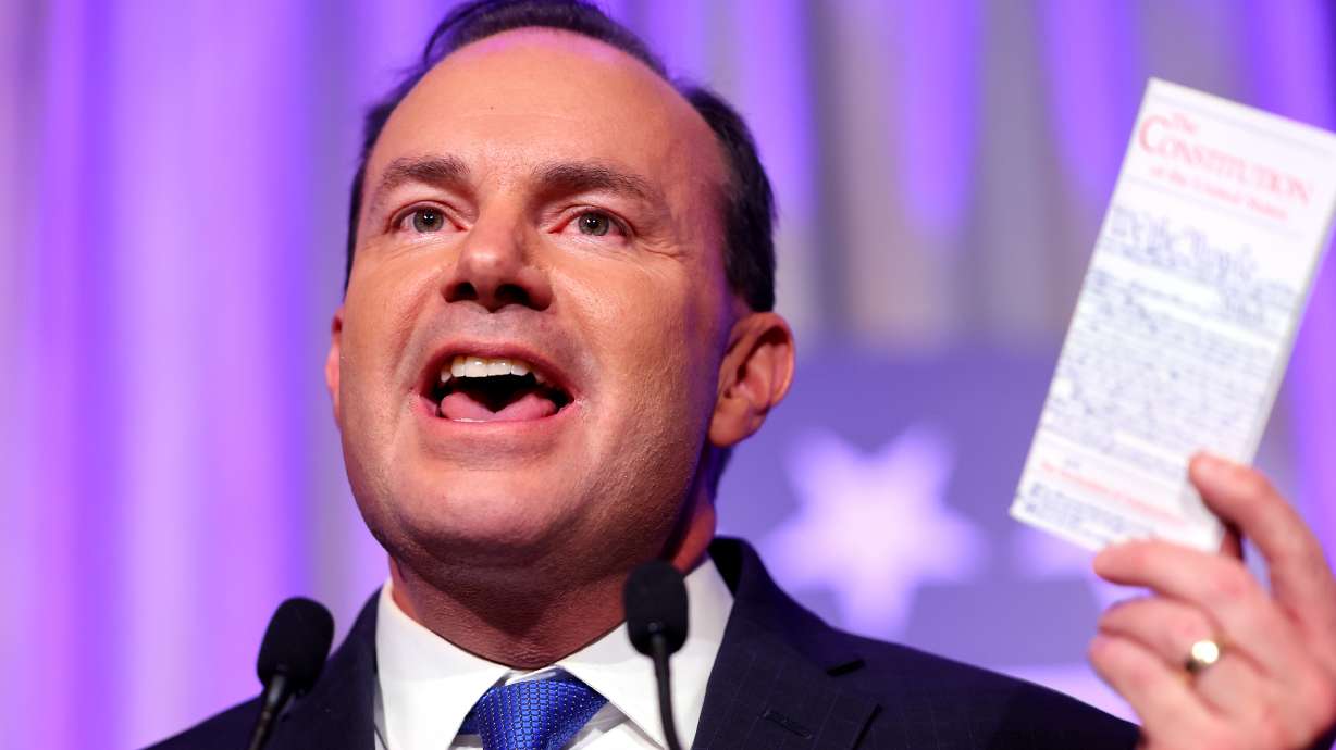Sen. Mike Lee speaks to a crowd of supporters at the Hyatt Regency in Salt Lake City on Nov. 8, 2022. Lee condemns Donald Trump's latest indictment, but he once questioned some of Trump's allies' 2020 election strategies.