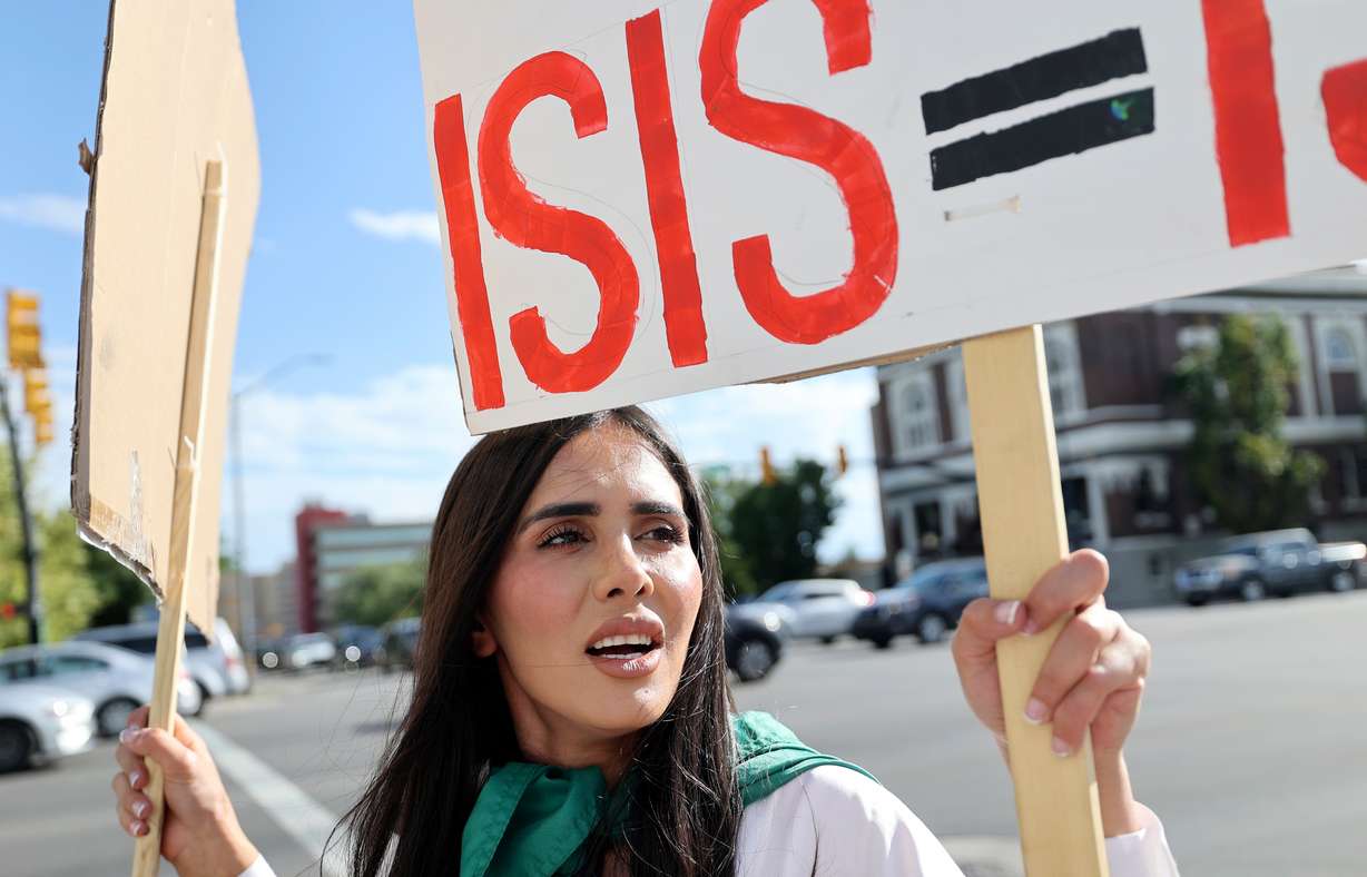 Afghan activist Crystal Bayat leads a protest on the second anniversary of Taliban takeover in Afghanistan on West Temple in downtown Salt Lake City on Tuesday.