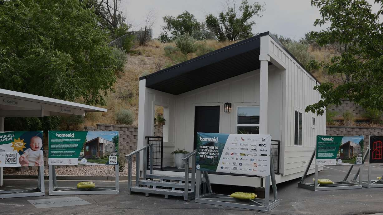 The HomeAid Collaboration Cottage built by community partners through the leadership of HomeAid Utah is shown Wednesday. The home will be in the Other Side Village, a community of tiny homes for the chronically homeless.