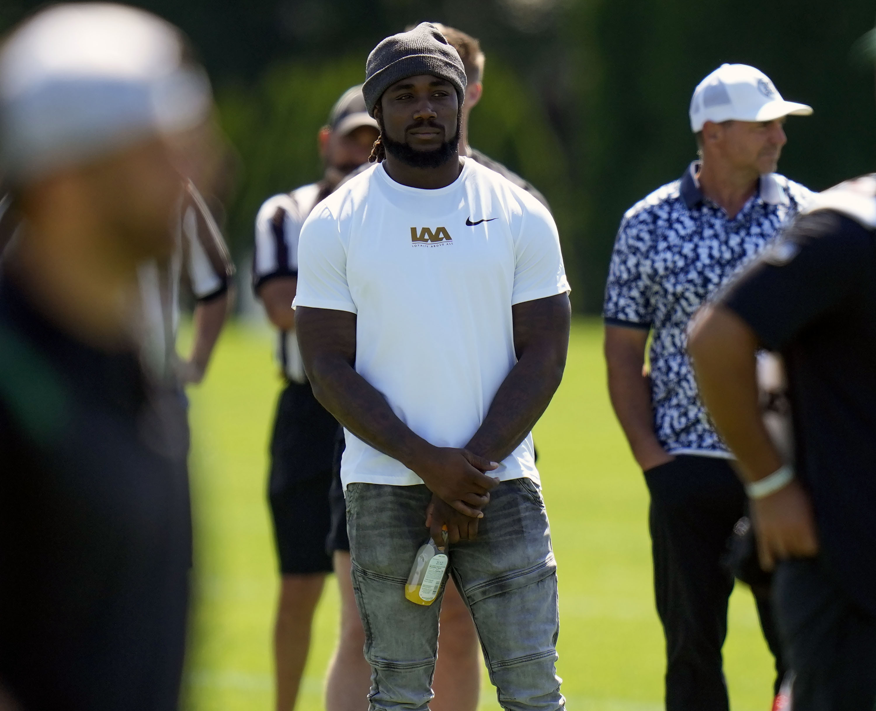 FILE - Dalvin Cook watches a New York Jets practice session at the NFL football team's training facility in Florham Park, N.J., July 30, 2023. A person with knowledge of the deal says the Jets agreed to terms on a one-year contract with former Minnesota Vikings running back Cook on Monday, Aug. 14, 2023, according to a person with knowledge of the deal.