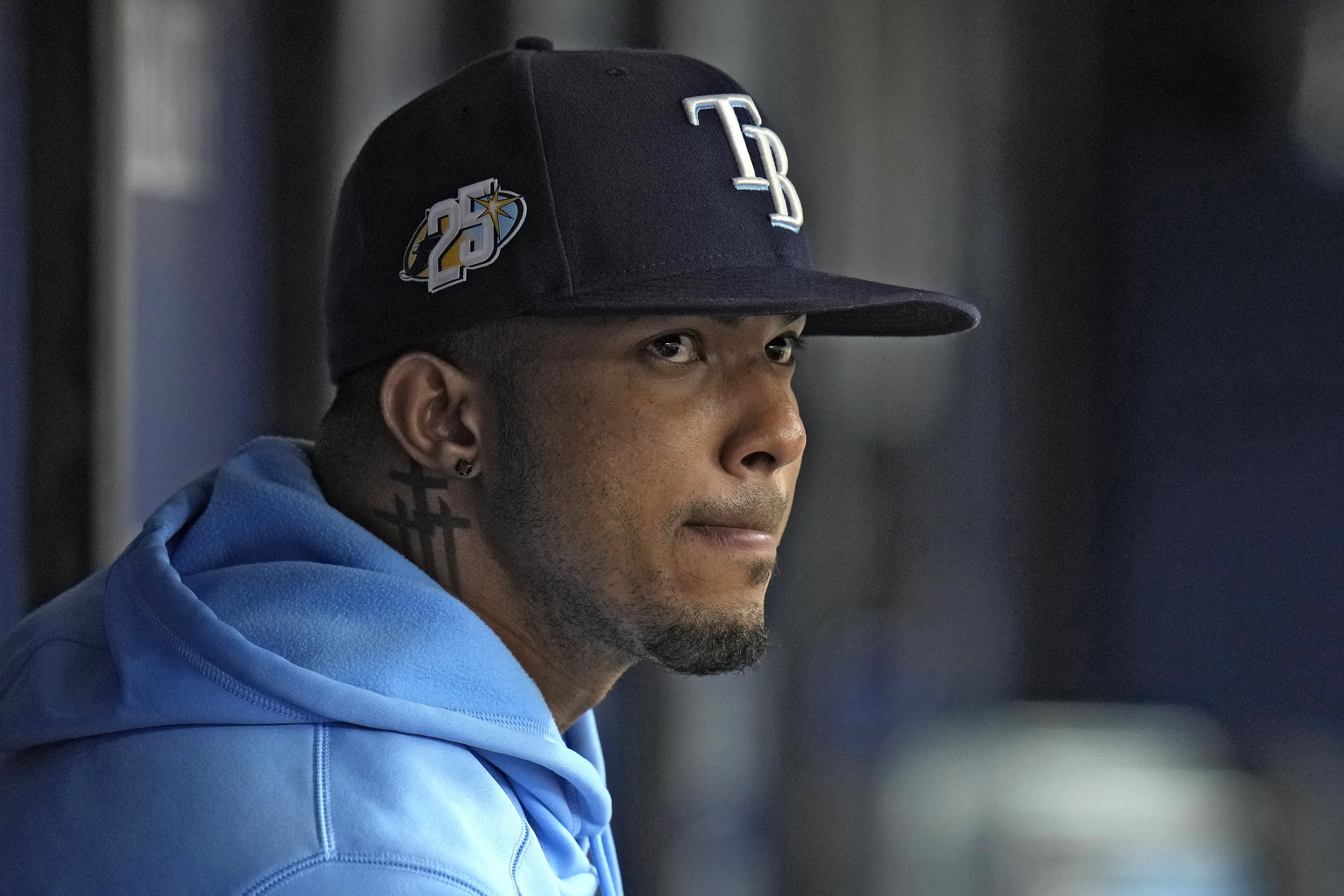 Tampa Bay Rays' Wander Franco watches from the dugout during the fifth inning of a baseball game against the Cleveland Guardians Sunday, Aug. 13, 2023, in St. Petersburg, Fla. 