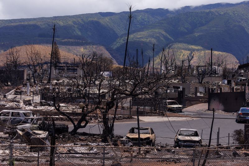 The fire ravaged town of Lahaina, Maui, Hawaii, is shown on Tuesday. Hawaiian Electric shares continued their record slump Thursday amidst scrutiny over whether the company's equipment might have played any role in the fire.