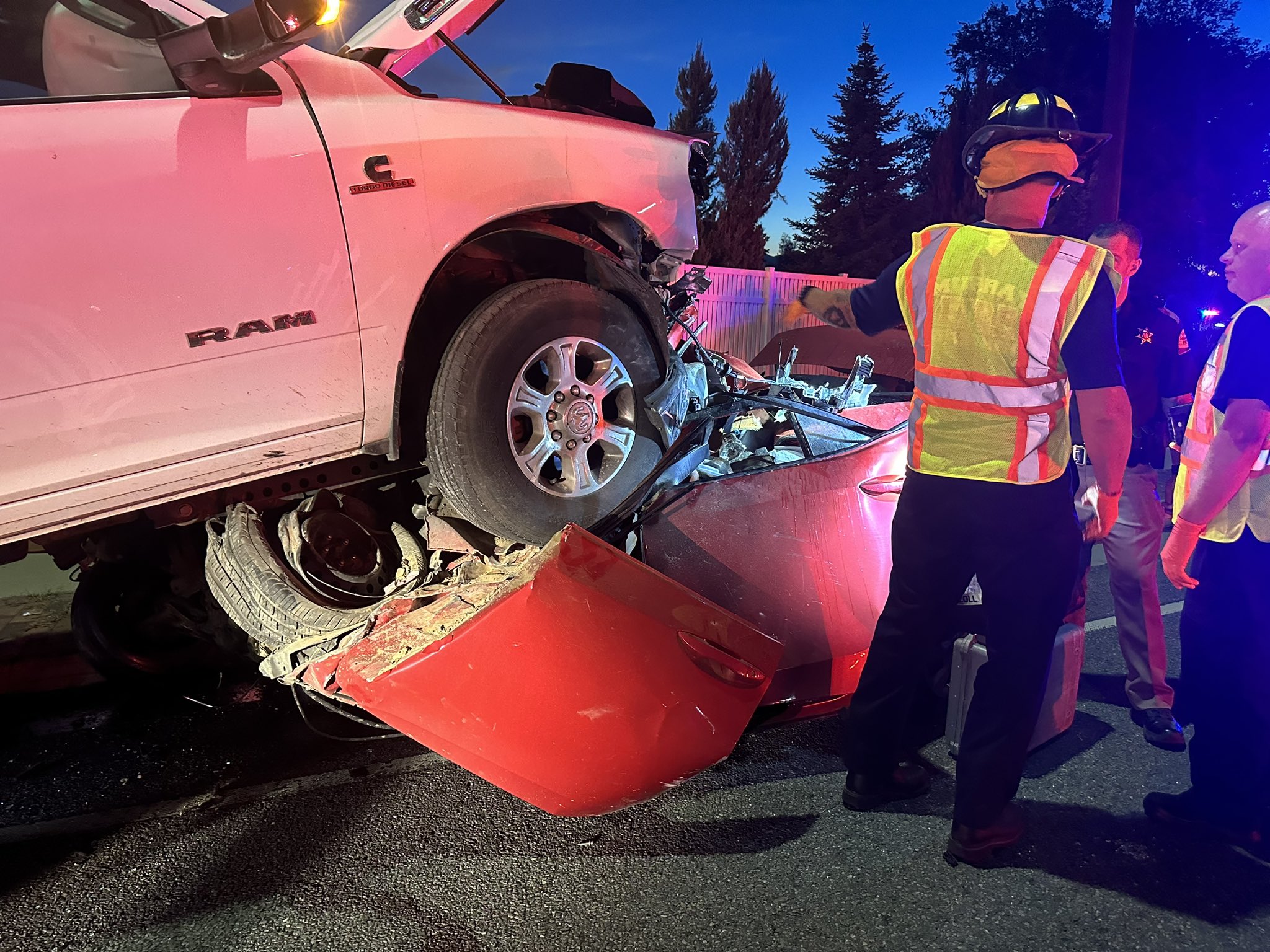 A woman was hospitalized after a multiple-vehicle crash in Cottonwood Heights trapped her inside for an hour, after a truck crushed her car and she needed to be extricated.