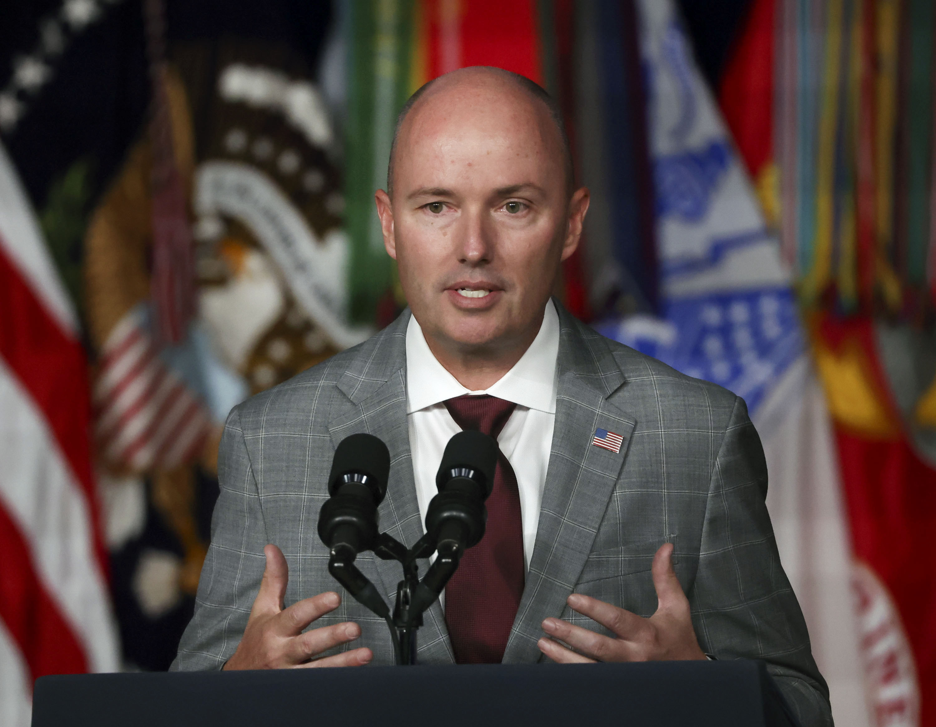 Gov. Spencer Cox speaks during President Joe Biden’s visit to Utah on Aug. 10. Cox says farm workers deserve dignity and respect.