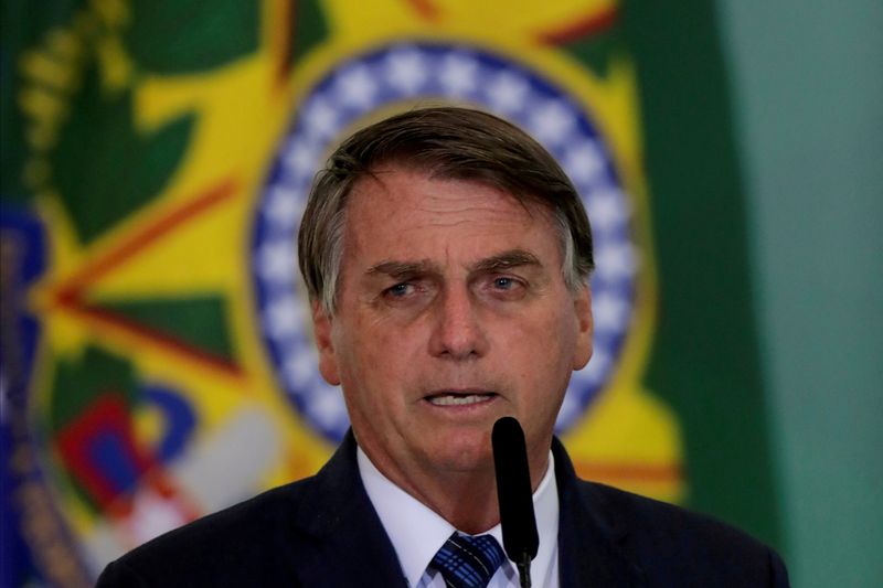 Then-Brazilian President Jair Bolsonaro speaks during a ceremony at Planalto Palace in Brasilia, Feb. 23, 2021. Bolsonaro was convicted of staging a coup to remain in power Thursday.