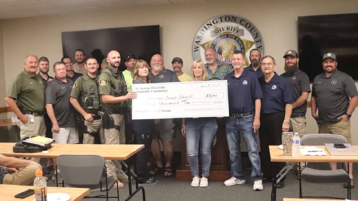 The St. George Elks Charitable Foundation presents a $15,000 check to the Washington County Sheriff’s Search and Rescue team for a new K-9 program, Hurricane, Aug. 2.