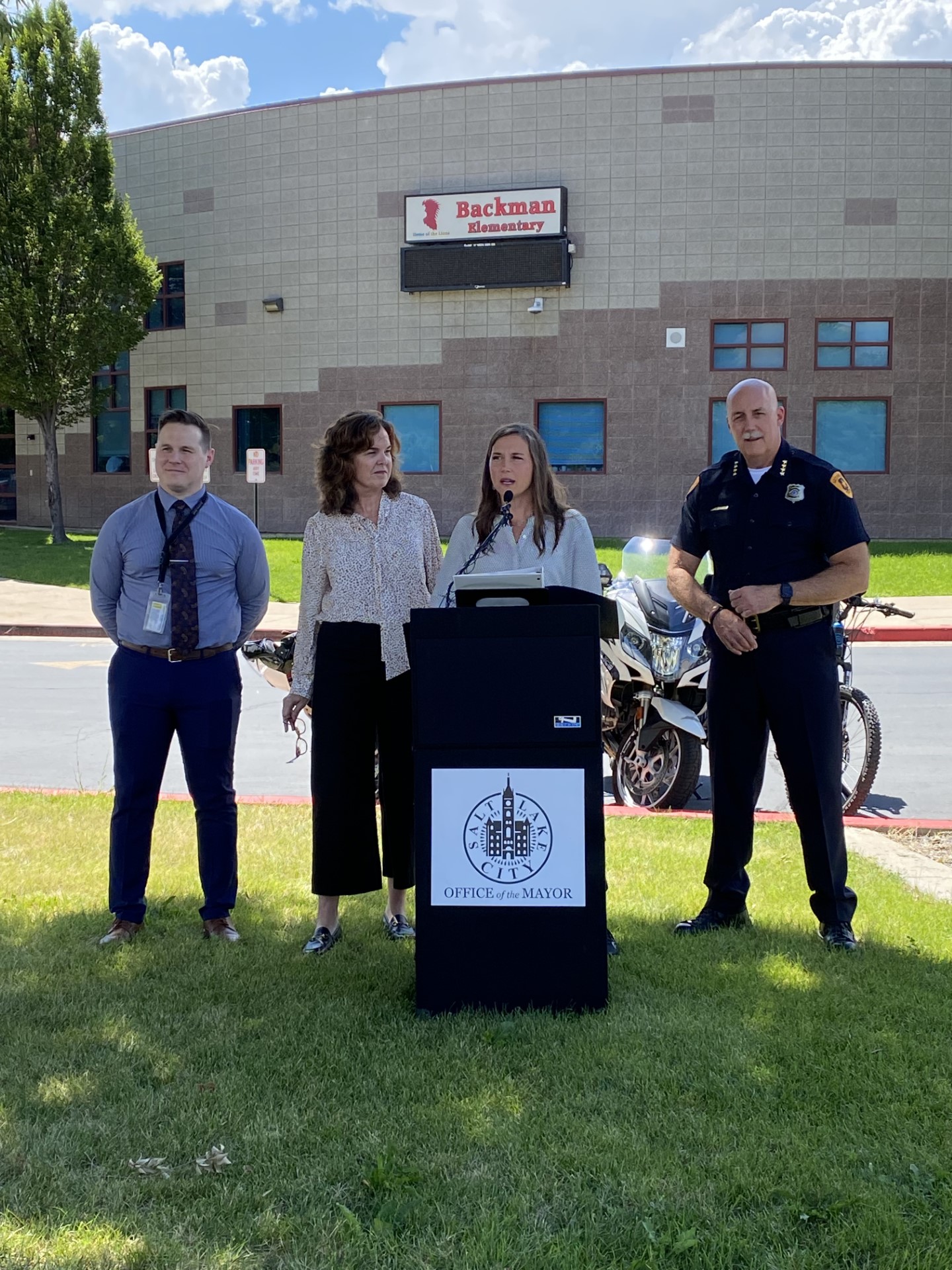 Backman Elementary School Principal Matthew Teitte, Salt Lake School District Superintendent Elizabeth Grant, Salt Lake City Mayor Erin Mendenhall and Police Chief Mike Brown hold a press conference Thursday at Backman Elementary.