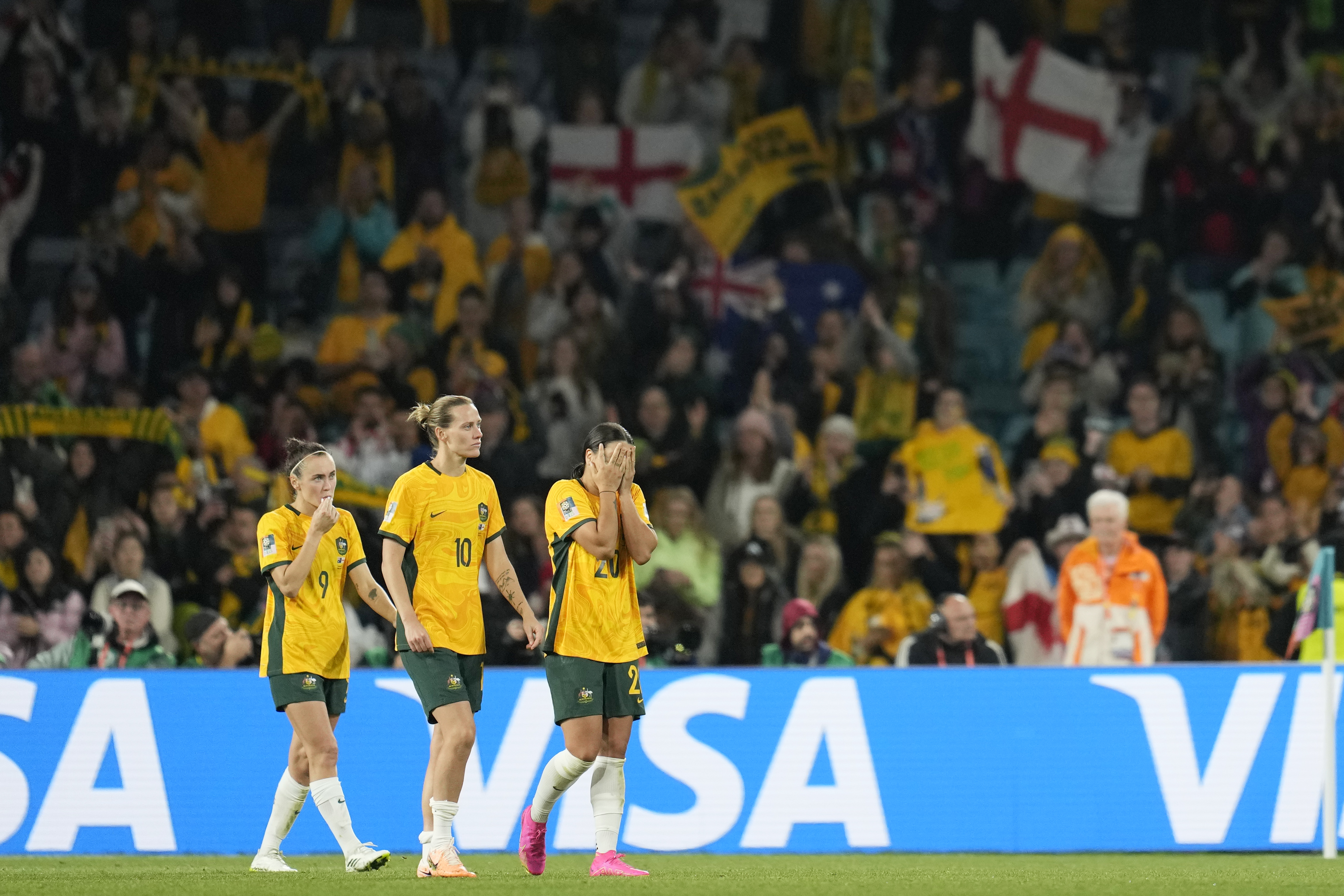 From left: Australia's Caitlin Foord, Emily Van Egmond and Sam Kerr walk after the Women's World Cup semifinal soccer match between Australia and England at Stadium Australia in Sydney, Australia, Wednesday, Aug. 16, 2023. 
