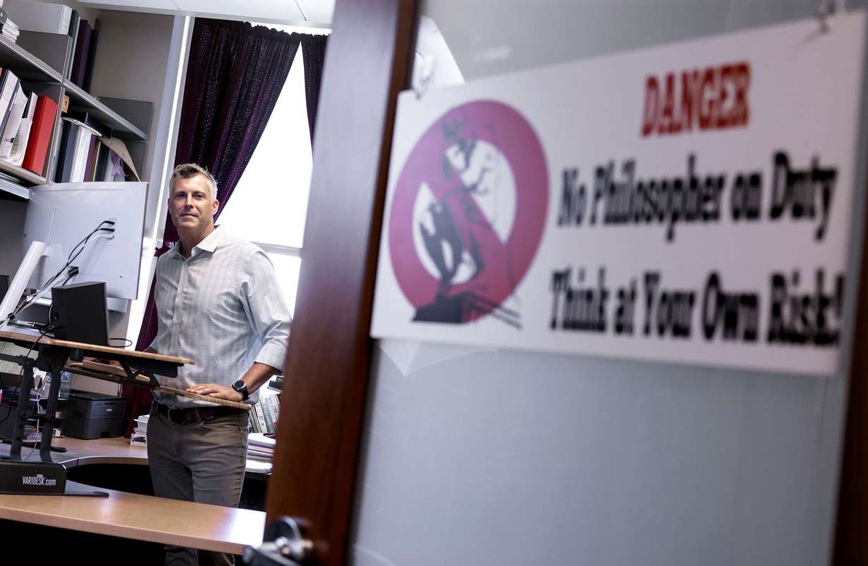 James Tabery works in his office at the university in Salt Lake City on Thursday, Aug. 17.