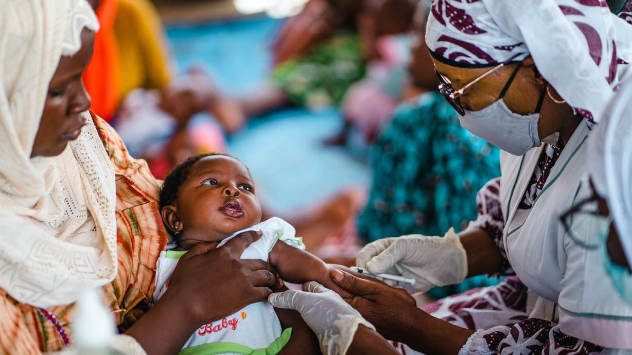 Manjilata Mohamed, 3 months, is vaccinated at the Community Health Center in Mali. A $10 million donation to UNICEF from The Church of Jesus Christ of Latter-day Saints will help in Mali and other countries.