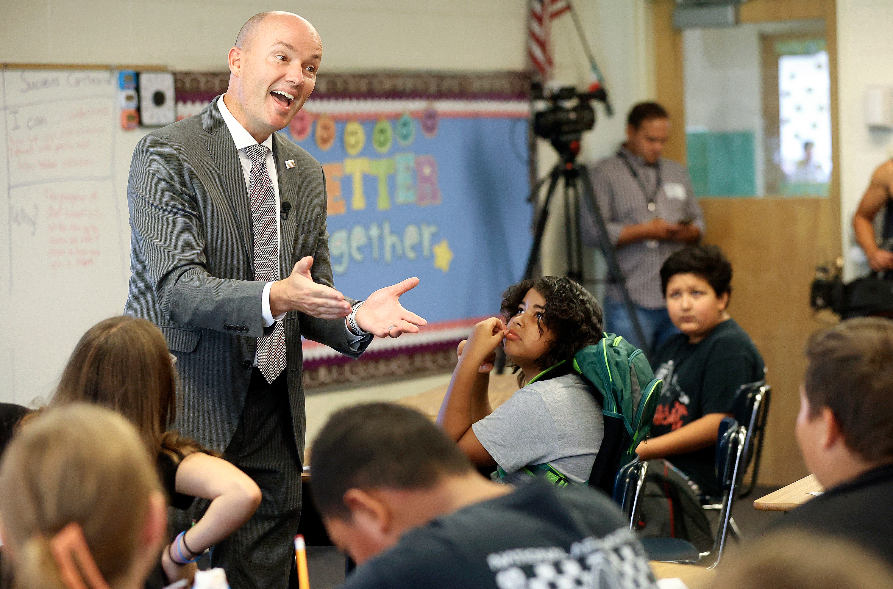 Utah Gov. Spencer Cox talks to sixth graders while visiting Magna Elementary School in Magna on Friday.