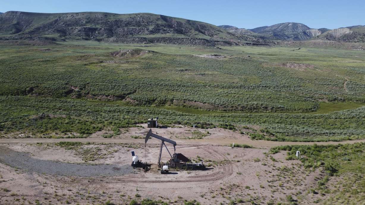 A pumpjack dips its head to extract oil in a basin north of Helper, Utah, July 13. A U.S. Appeals Court on Friday struck down a critical approval for a railroad project that would have allowed oil businesses in eastern Utah to significantly expand fossil fuel production and exports.
