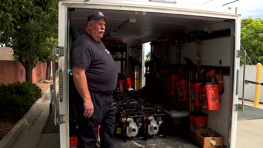 Cedar City Fire Battalion Chief Erick Cox stands in the department’s flood trailer