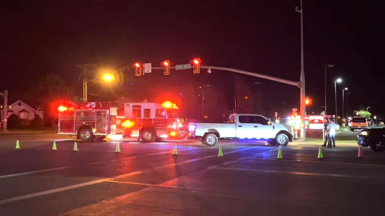 Emergency crews investigate the scene of a crash at 3500 W. 5600 South in Roy, where a 31-year-old motorcyclist died Friday evening.