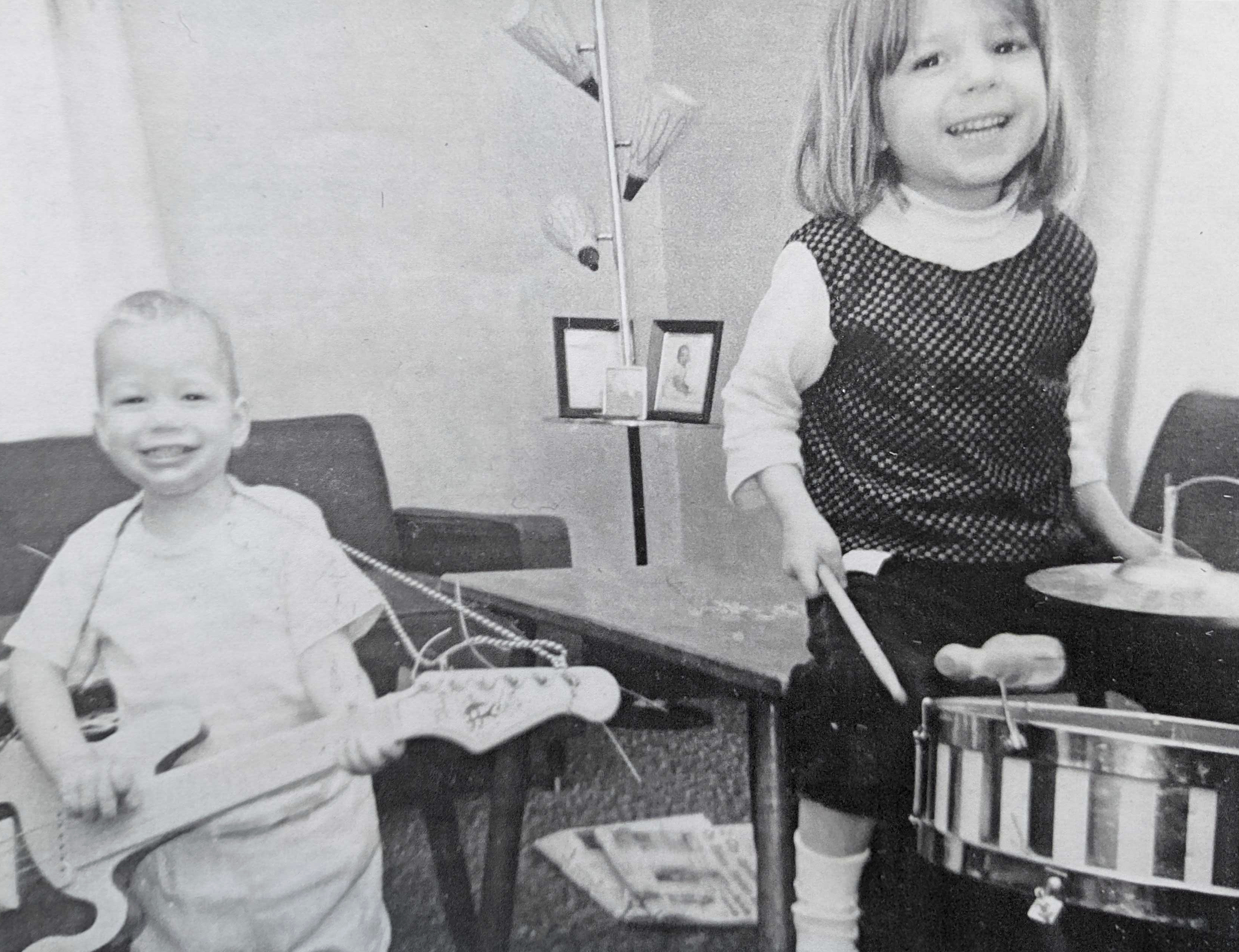 This family photo provided in August shows siblings Maurice “Mo” Miller, left, and Mary Miller-Duffy as children playing with their Christmas gifts. In 2023, Mary was dazed and grieving. Her brother suddenly collapsed and days later was brain-dead. Now she faced a tough question: Would she donate his body for research?