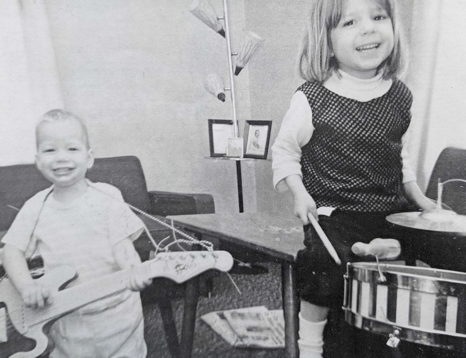 This family photo provided in August shows siblings Maurice “Mo” Miller, left, and Mary Miller-Duffy as children playing with their Christmas gifts. In 2023, Mary was dazed and grieving. Her brother suddenly collapsed and days later was brain-dead. Now she faced a tough question: Would she donate his body for research?