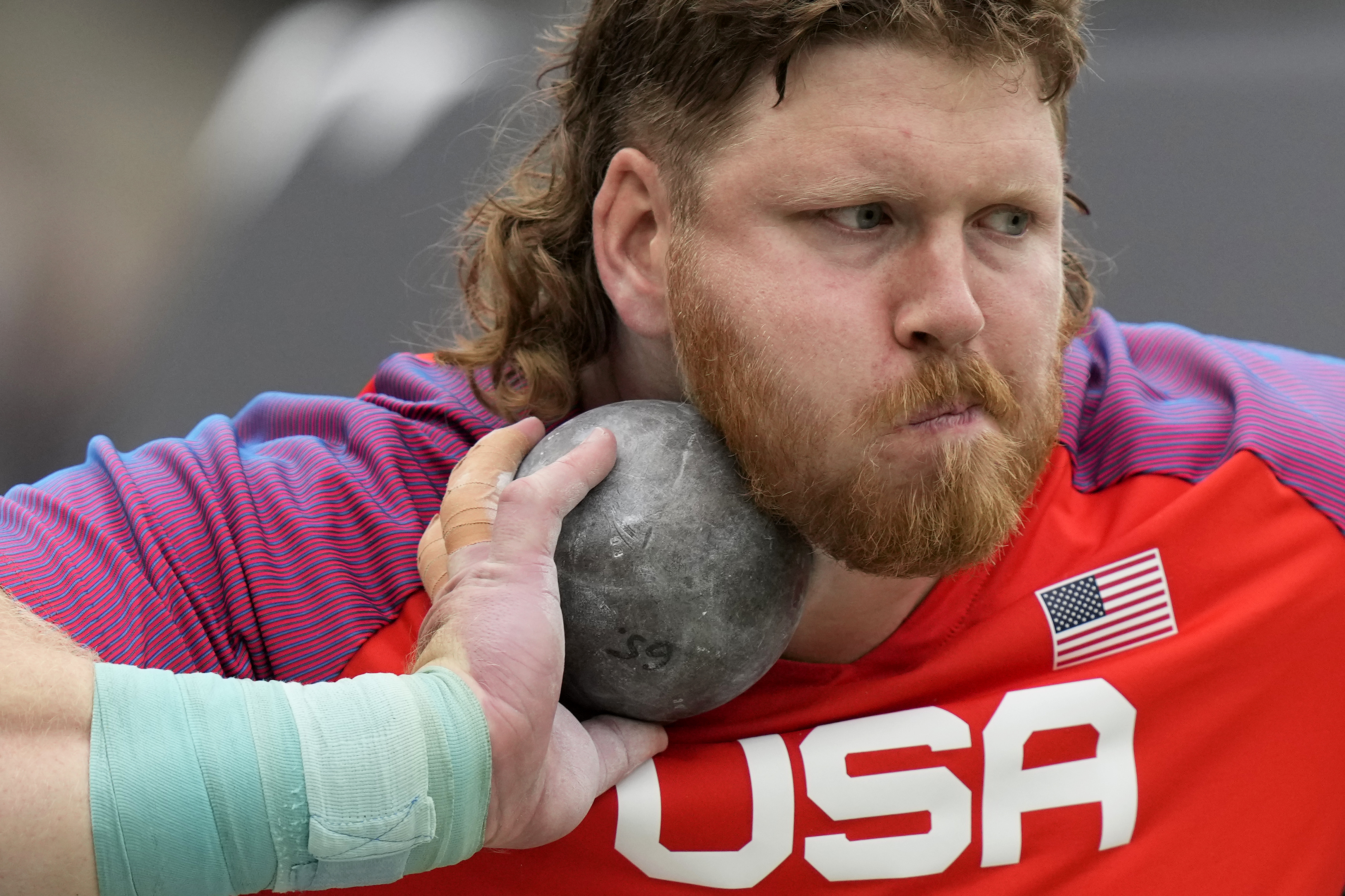 Ryan Crouser, of the United States, makes an attempt in the Men's shot put qualification during the World Athletics Championships in Budapest, Hungary, Saturday, Aug. 19, 2023. 