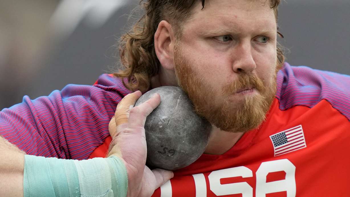 Ryan Crouser, of the United States, makes an attempt in the Men's shot put qualification during the World Athletics Championships in Budapest, Hungary, Saturday, Aug. 19, 2023.