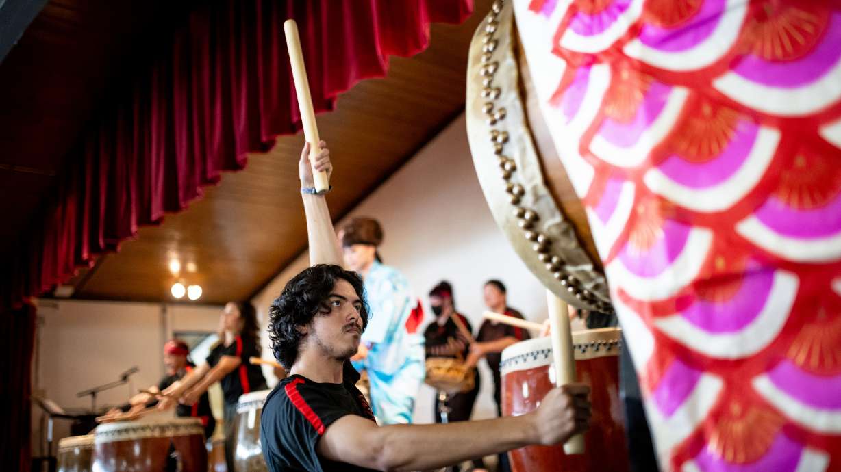 Tyler Uyeda performs on taiko drums with Kenshin Taiko during Natsu Matsuri, a Japanese culture festival at the Japanese Church of Christ in Salt Lake City on Saturday.