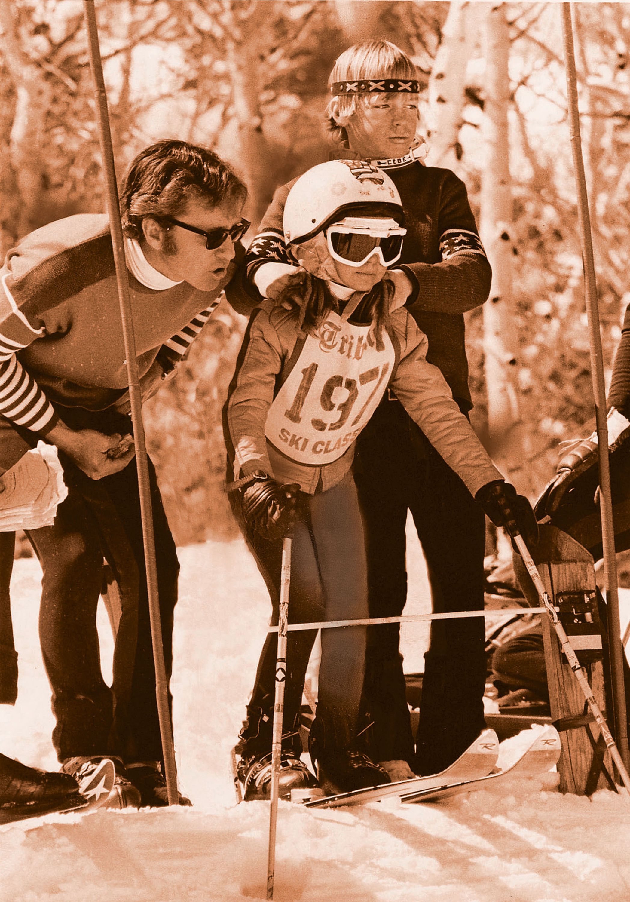 Utah Racing School coach Butch Hoffman instructs daughter, Heidi Hoffman, in the starting gate on March 25, 1973, at the Salt Lake Ski Classic. Her brother, Scott Hoffman, gives her a few tips.