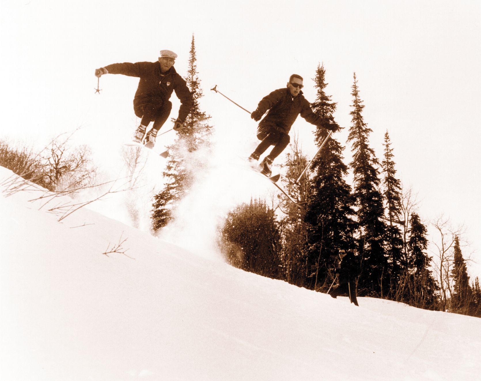 Earl Miller and Butch Hoffman jumping off School Hill at Snowbasin on Jan. 20, 1965. Hoffman became a certified ski instructor with the Earl Miller Ski School.